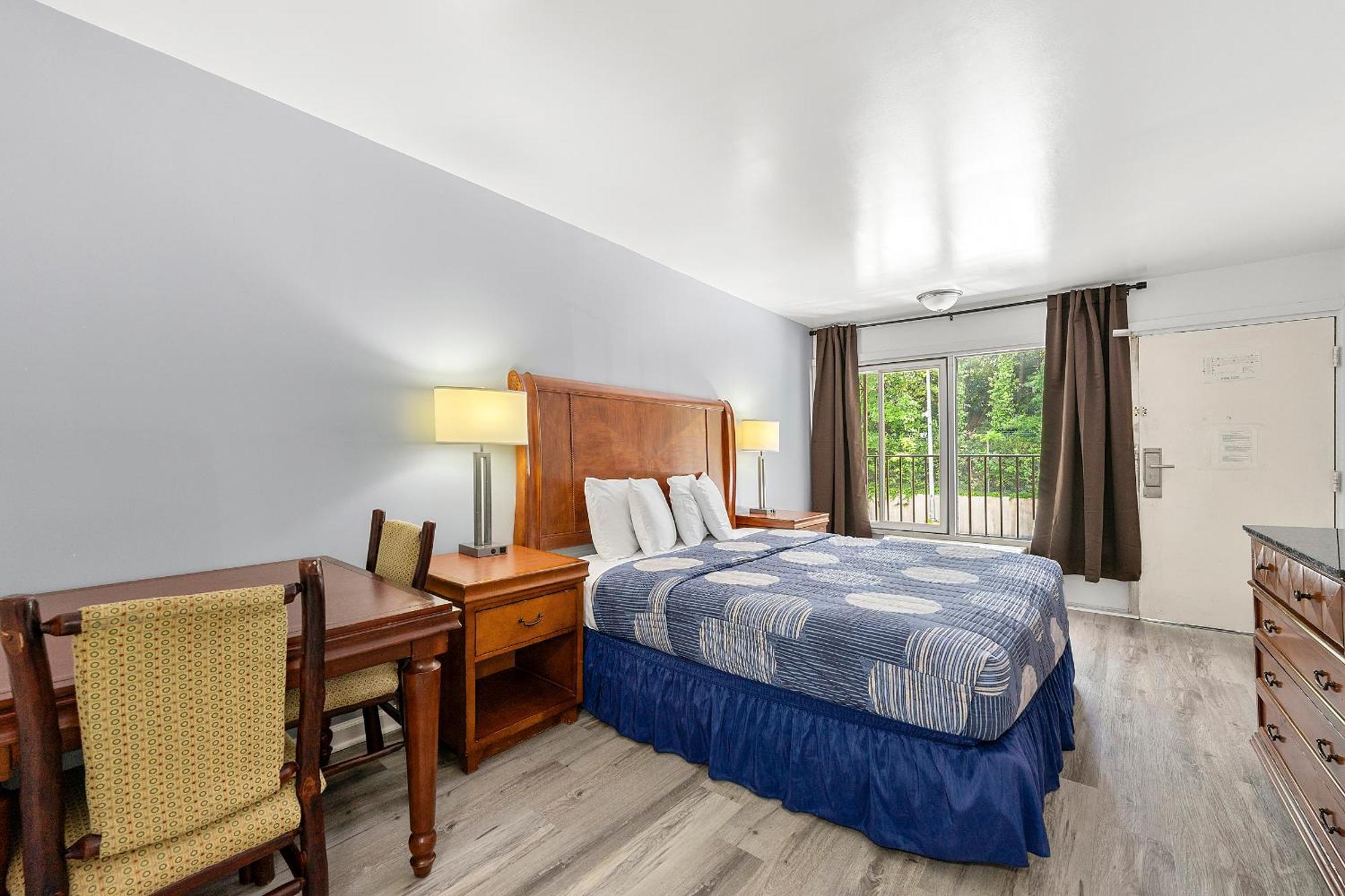 Budgetel Inn And Suites Lodge West ภายนอก รูปภาพ